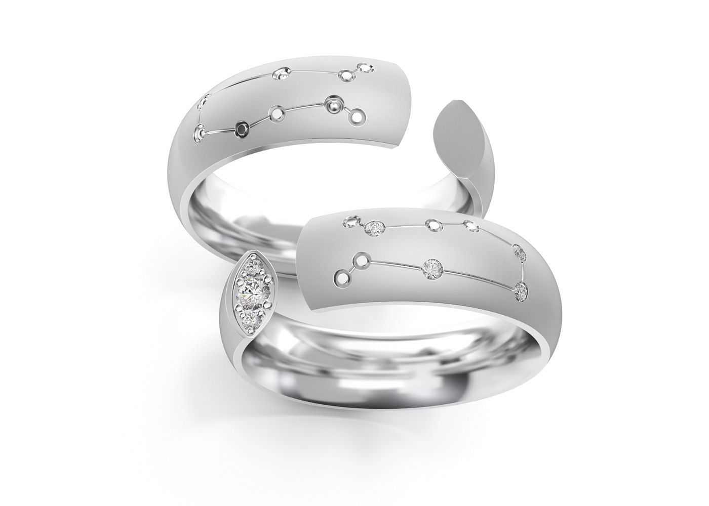 Pair of silver Gemini rings from the Zodiac Collection on white background.