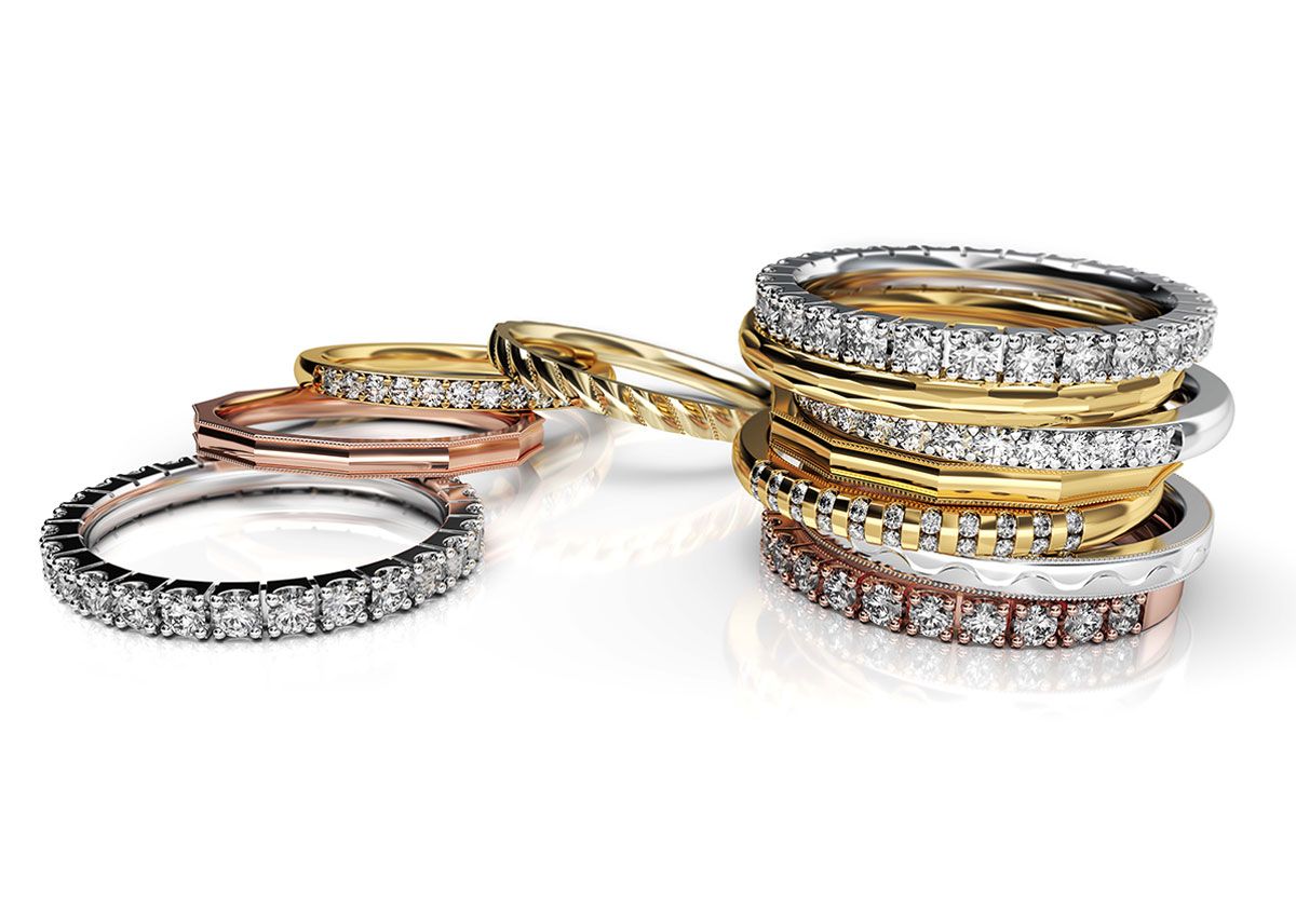 Stack of rings in a variety of colors and metal types