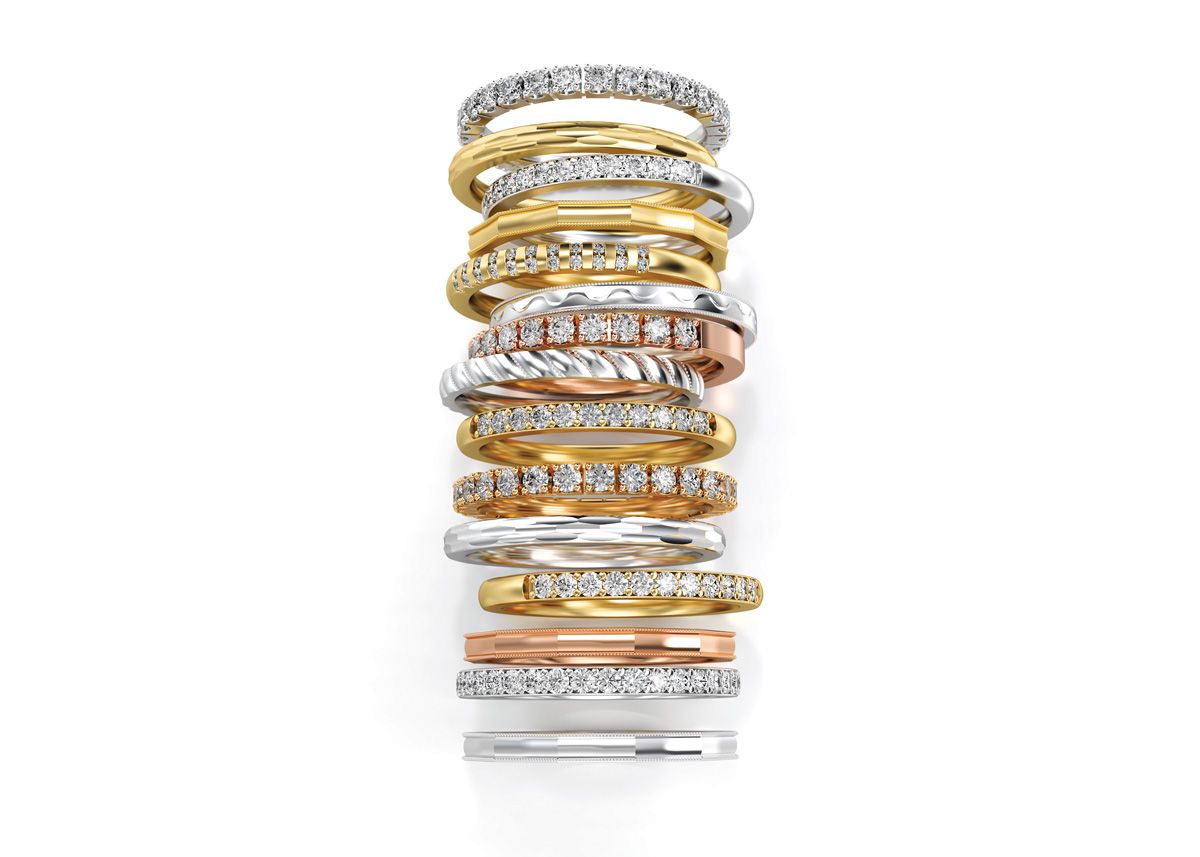 stack of engagement rings in a variety of colors, shapes and sizes 