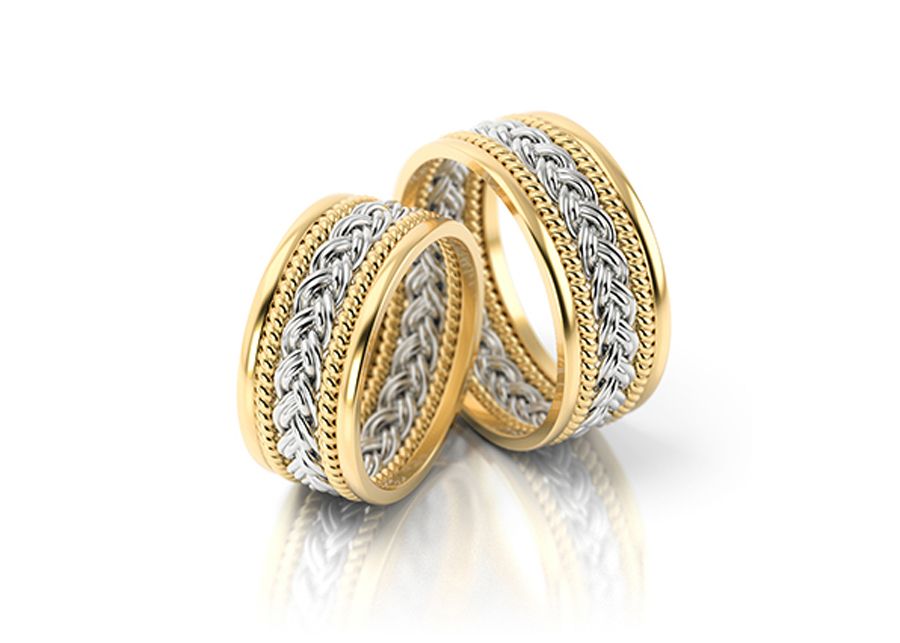 A pair of gold and silver twisting rings from Kuczora