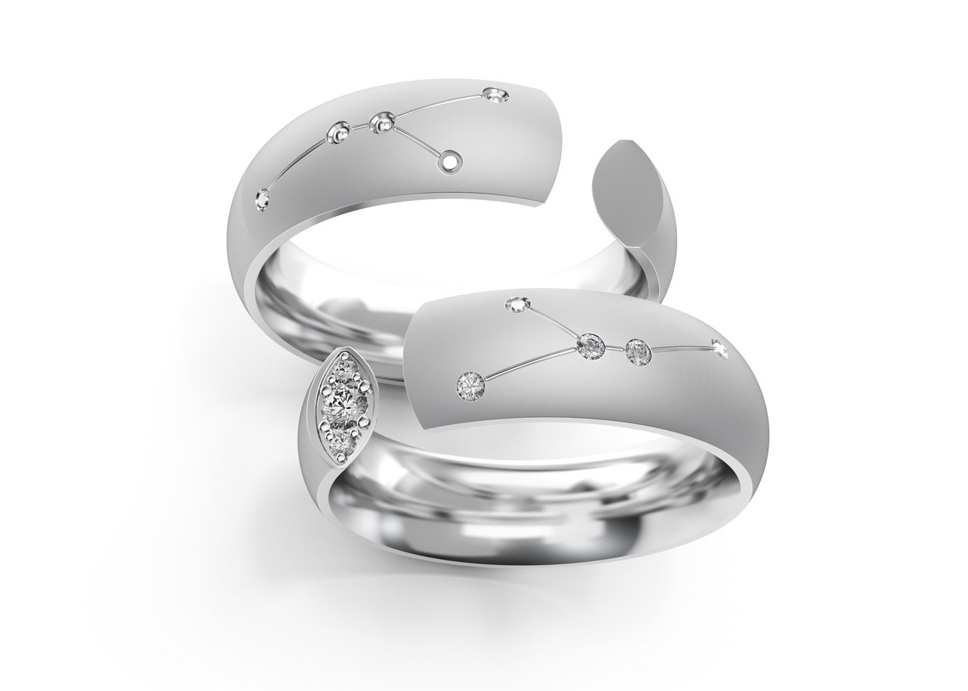 Pair of silver Cancer rings from the Zodiac Collection on white background.